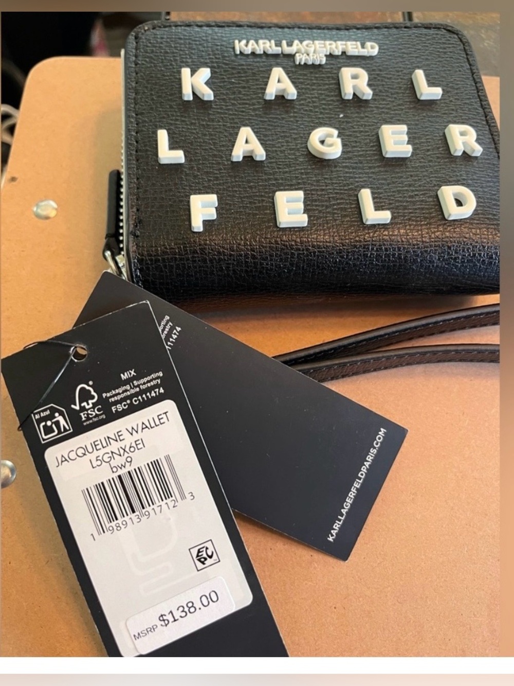 Karl Lagerfeld Black and White
Leather Wristlet NEW WITH  TAGS
